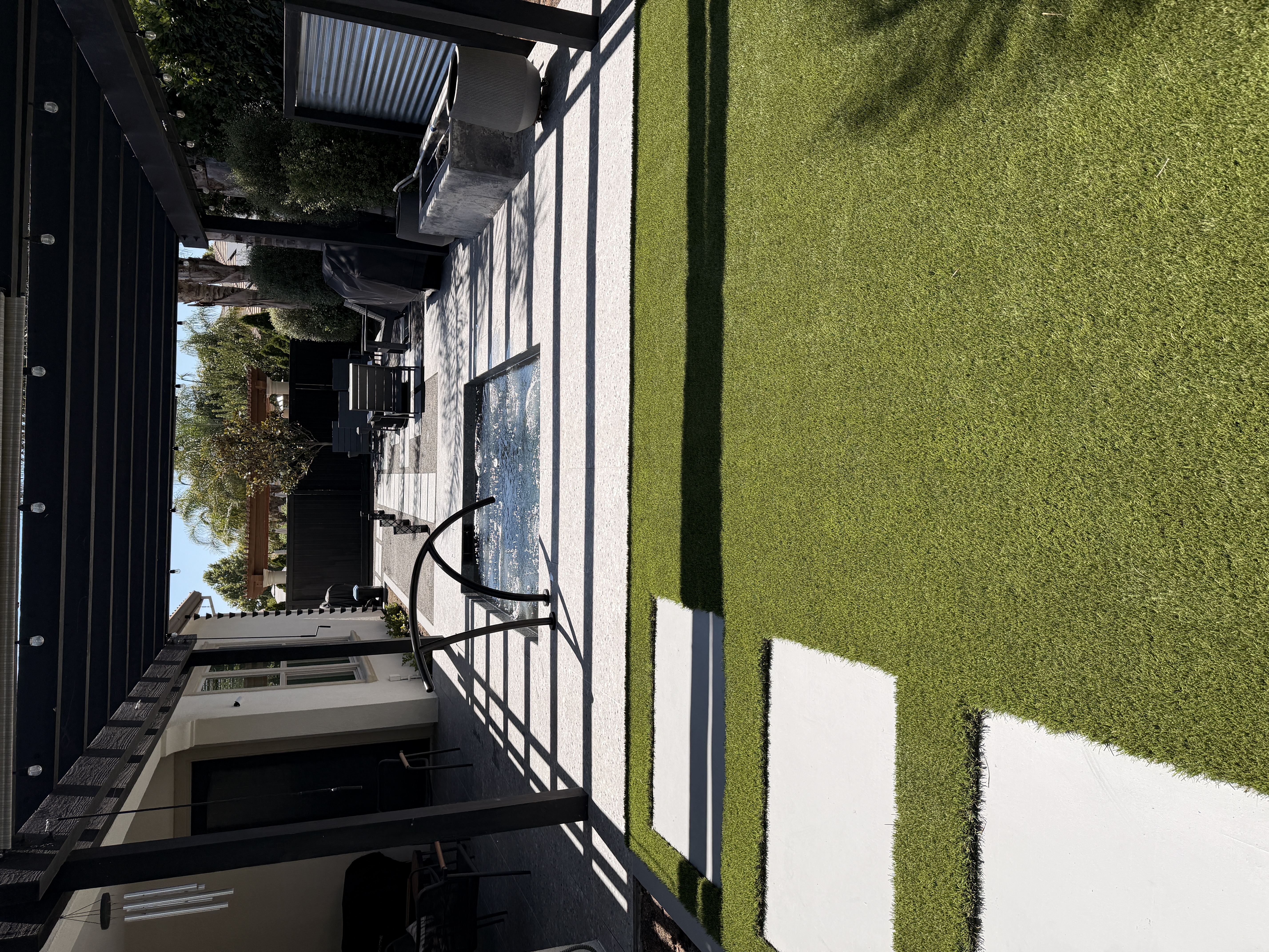 Spa courtyard with pergola and terrazzo paving